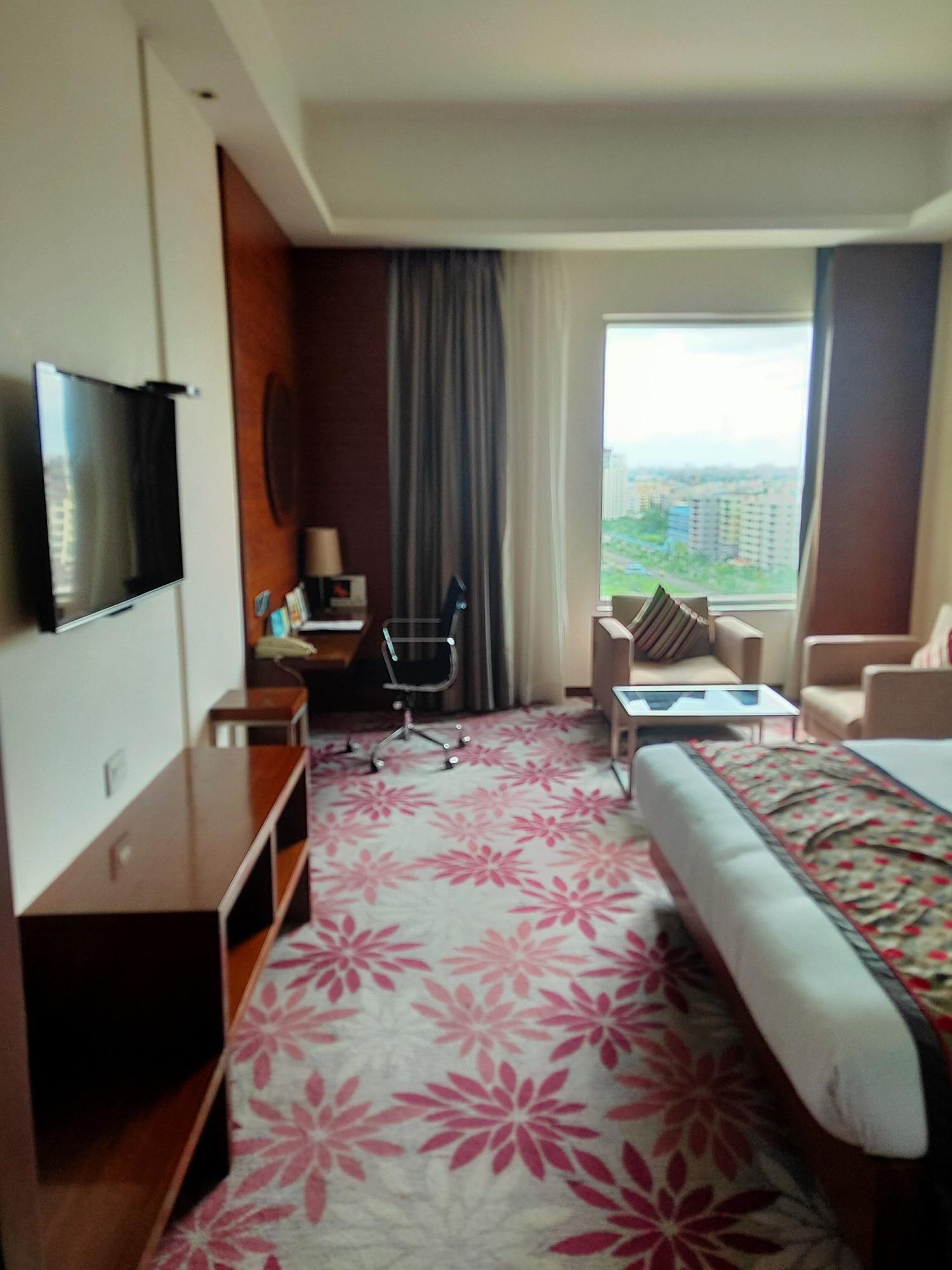 加尔各答普赖德广场酒店 外观 照片 A room at the hotel