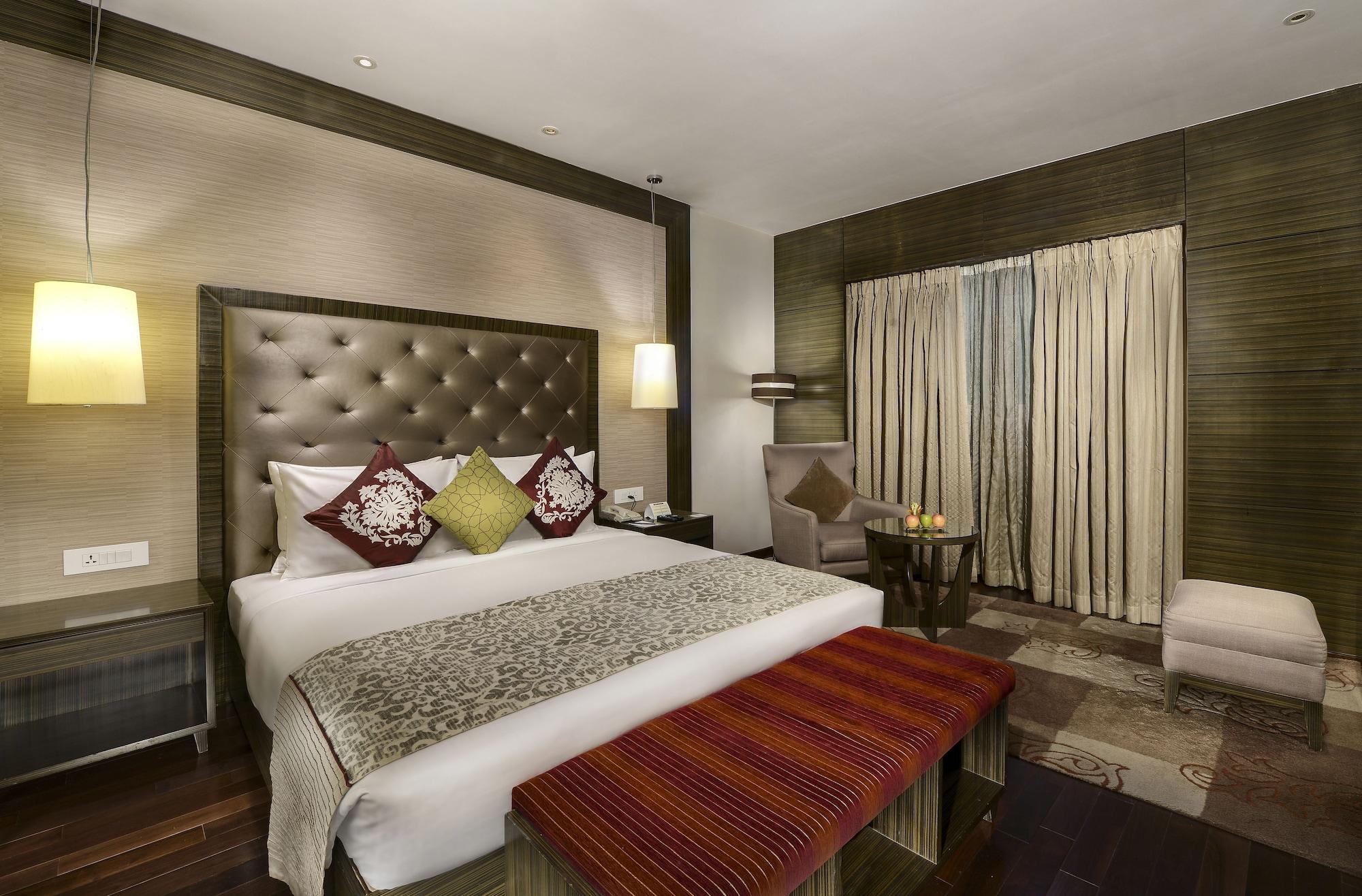 加尔各答普赖德广场酒店 外观 照片 A room at the Taj Bengal