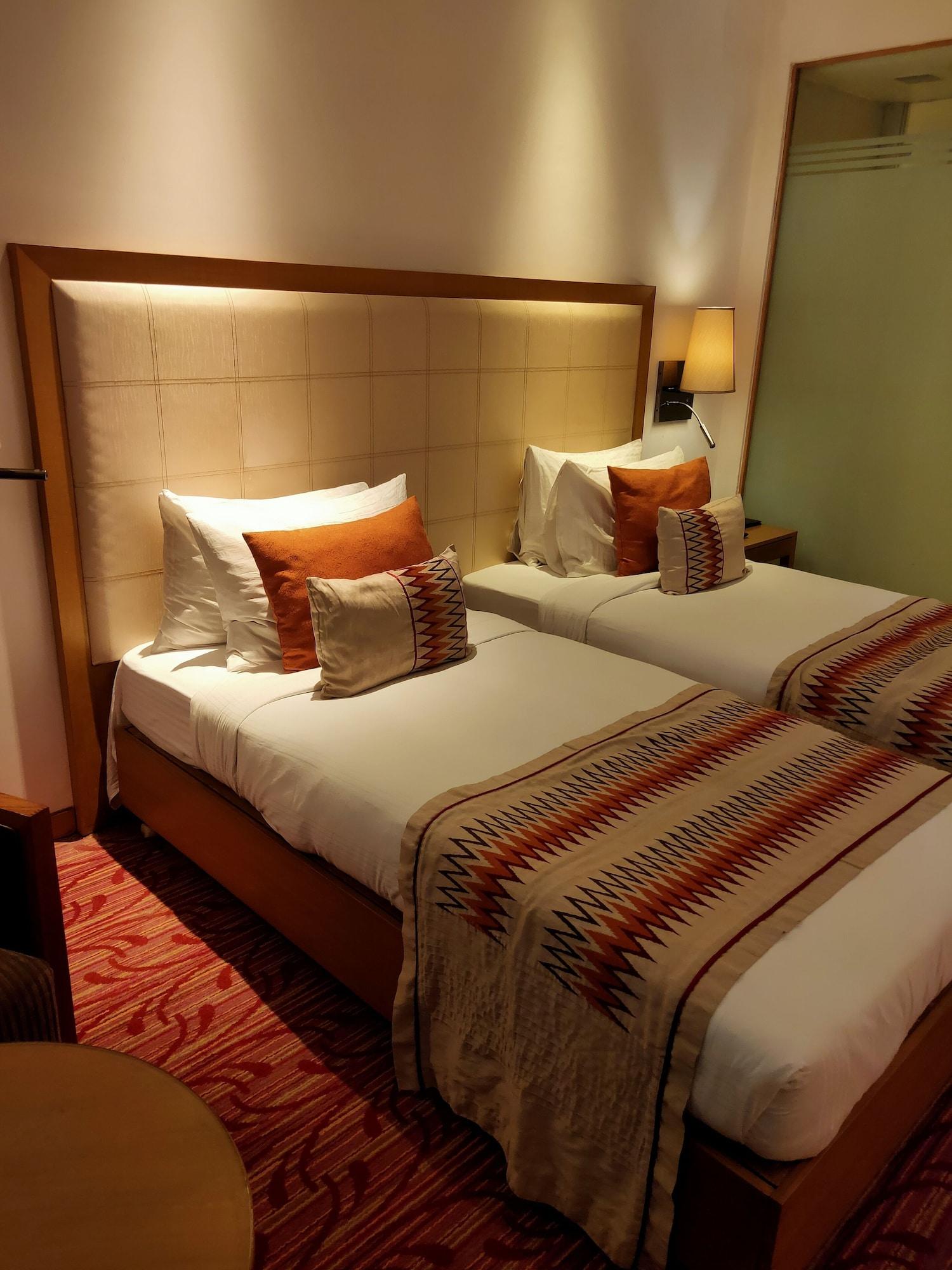 加尔各答普赖德广场酒店 外观 照片 A room at the hotel
