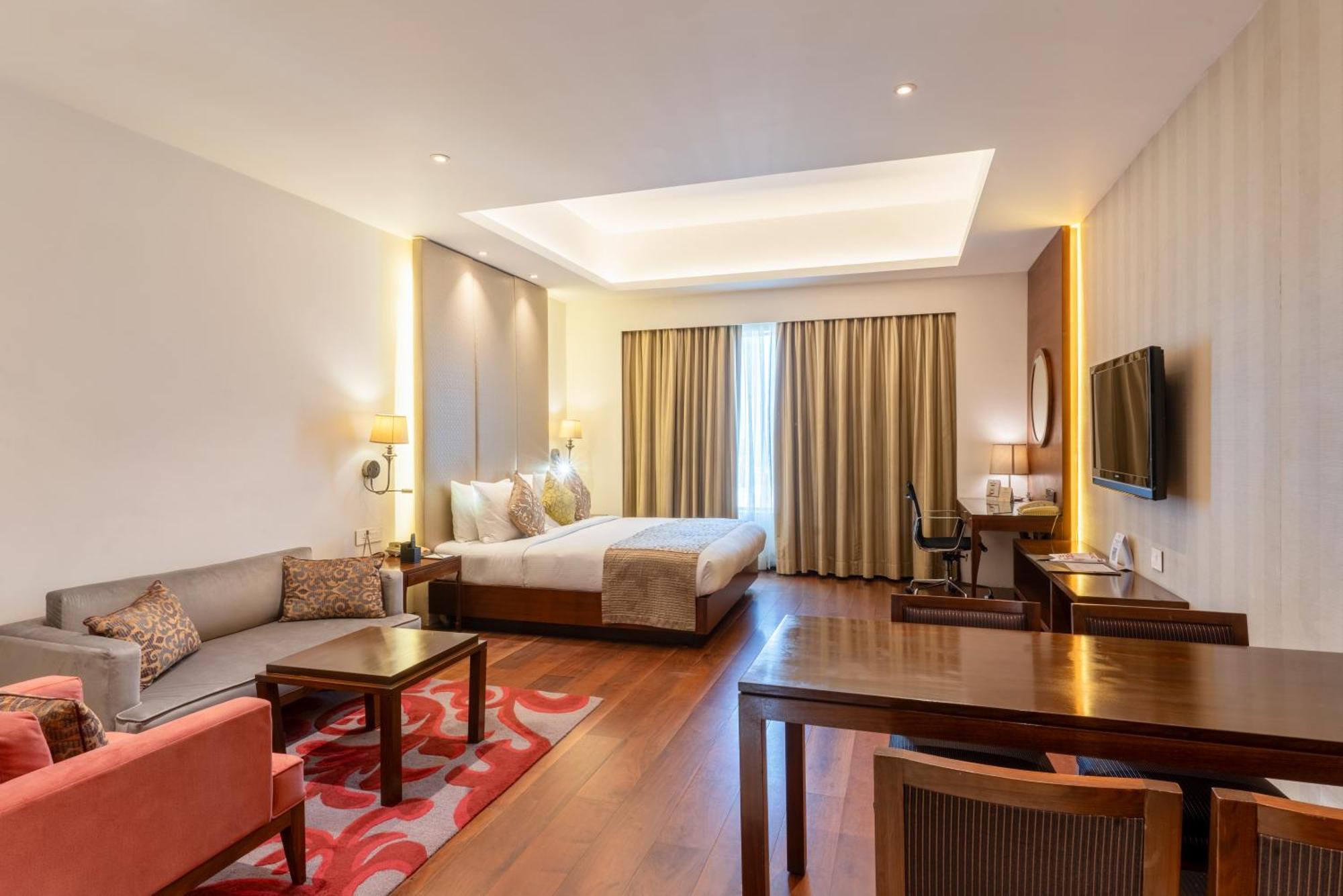 加尔各答普赖德广场酒店 外观 照片 A room at the hotel