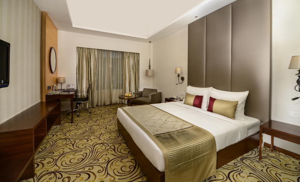 加尔各答普赖德广场酒店 外观 照片 A room at the Taj Bengal
